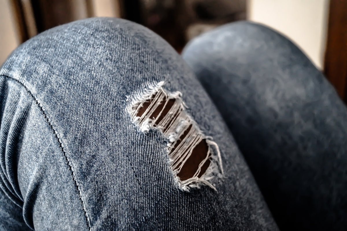 How Distressed Jeans Became a Staple in Women's Wardrobes - THE AMERICAN BLUE