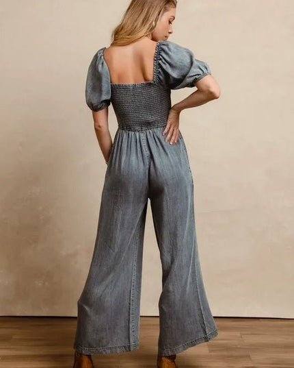 BiBi Smocked Washed Puff Sleeve Square Neck Denim Jumpsuit - THE AMERICAN BLUE