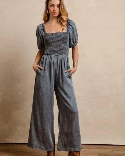 BiBi Smocked Washed Puff Sleeve Square Neck Denim Jumpsuit - THE AMERICAN BLUE